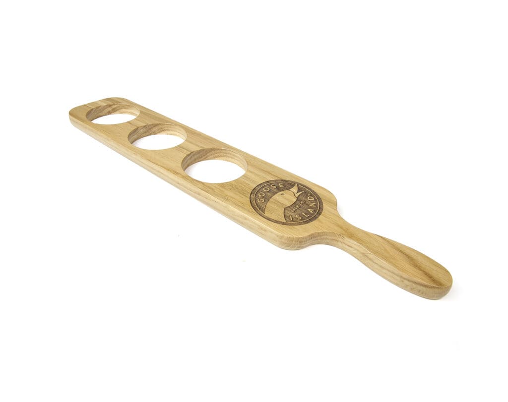 Wooden beer flight paddle with three circular glass cutouts and Goose Island logo, laser engraved