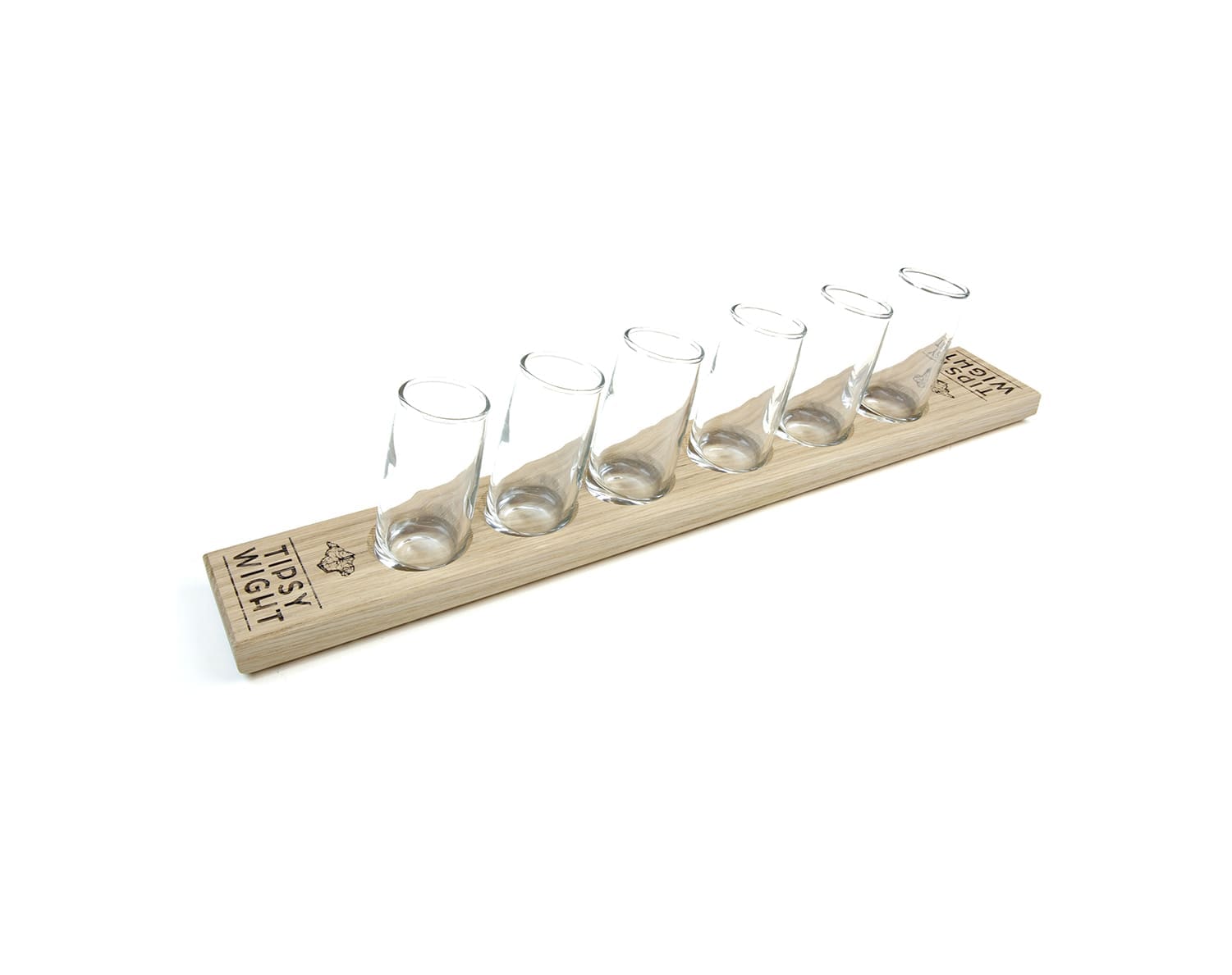 Six tasting glasses placed along a natural ash flight board with recessed holders and Tipsy Wight logo